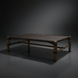 Surya Porta outdoor coffee table with charcoal matte stone top, brown hand-painted aluminum base, and PE rope detail.