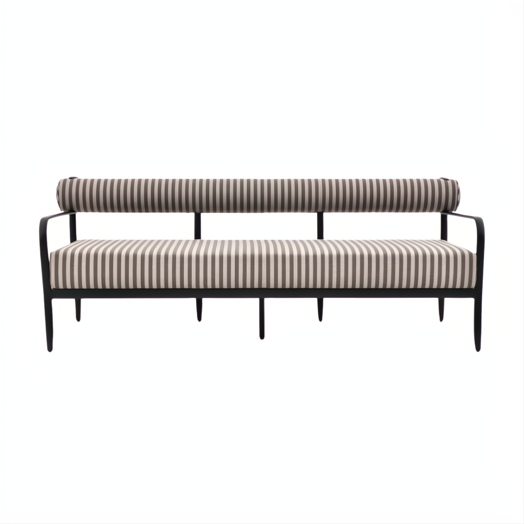 Surya Antibes outdoor sofa with brown and beige vertical stripes, black aluminum frame, and channel stitch detail.