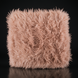 Soft, plush pink faux fur throw with shaggy texture, perfect for cozy home decor.