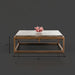 Industrial-modern concrete coffee table with a sleek metal frame, 42" wide and 15" high.