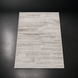 Surya Floria hand-woven rug, light beige recycled PET yarn, low-profile, neutral tones.