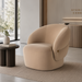 Surya Katarina accent chair, beige polyester upholstery, curved design, natural rubber wood base.