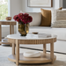 Surya Rosemary white marble top coffee table with a fluted mango wood base and lower shelf.