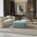 Surya Alepa ALPA-002 light blue rectangular upholstered ottoman in a modern living room.