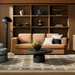 Black sandblasted mango wood round coffee table with a turned base in a living room setting.