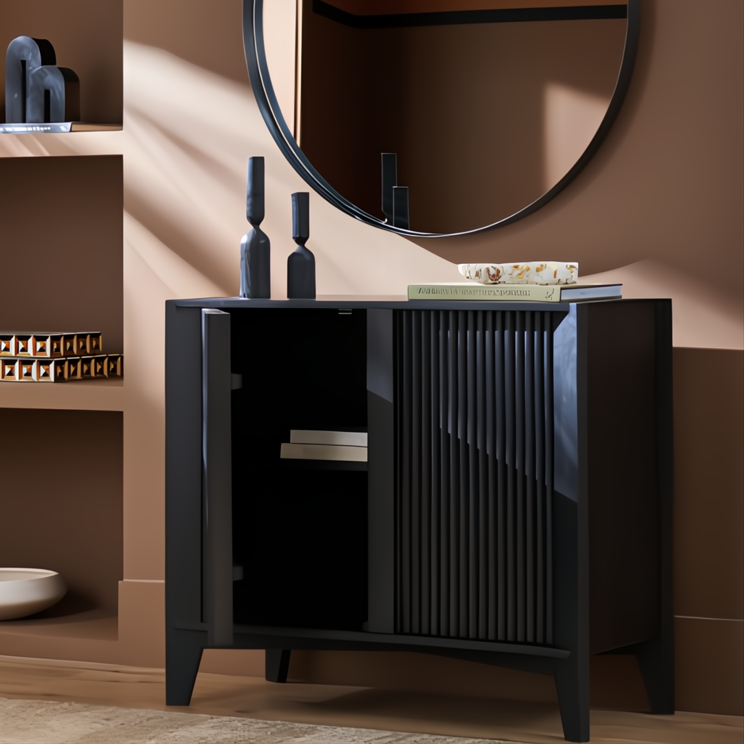 Black mango wood Surya Ronan Cabinet with fluted door, open to reveal an adjustable shelf.