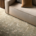 Contemporary Surya Aira beige polyester sofa with clean lines, shown from an elevated angle.