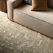 Contemporary Surya Aira beige polyester sofa with clean lines, shown from an elevated angle.