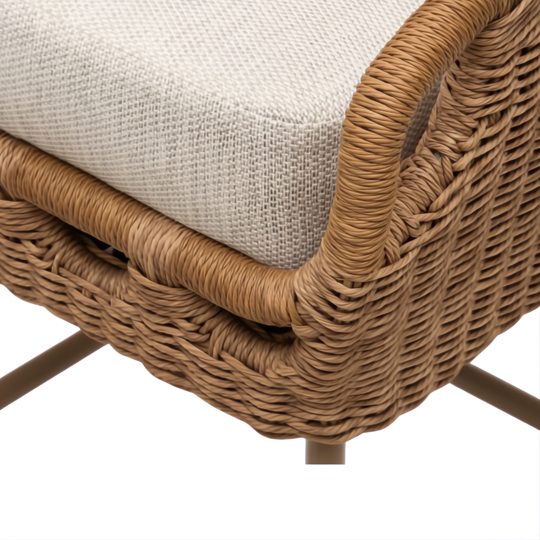 Close-up of a Surya Marvella Bar Stool with a light beige Sunbrella cushion and brown woven wicker base.
