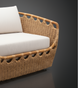 Marvella Sectional Right Arm with natural wicker frame, light Sunbrella cushions, and unique cutout design.