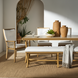 Surya Cape Town Bench in wheat, an outdoor-safe, low-profile bench with white Sunbrella upholstery and aluminum frame.