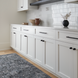 Surya Calgary CGR-2305-P rug, hand-tufted from recycled PET yarn, with a multi-color abstract pattern.