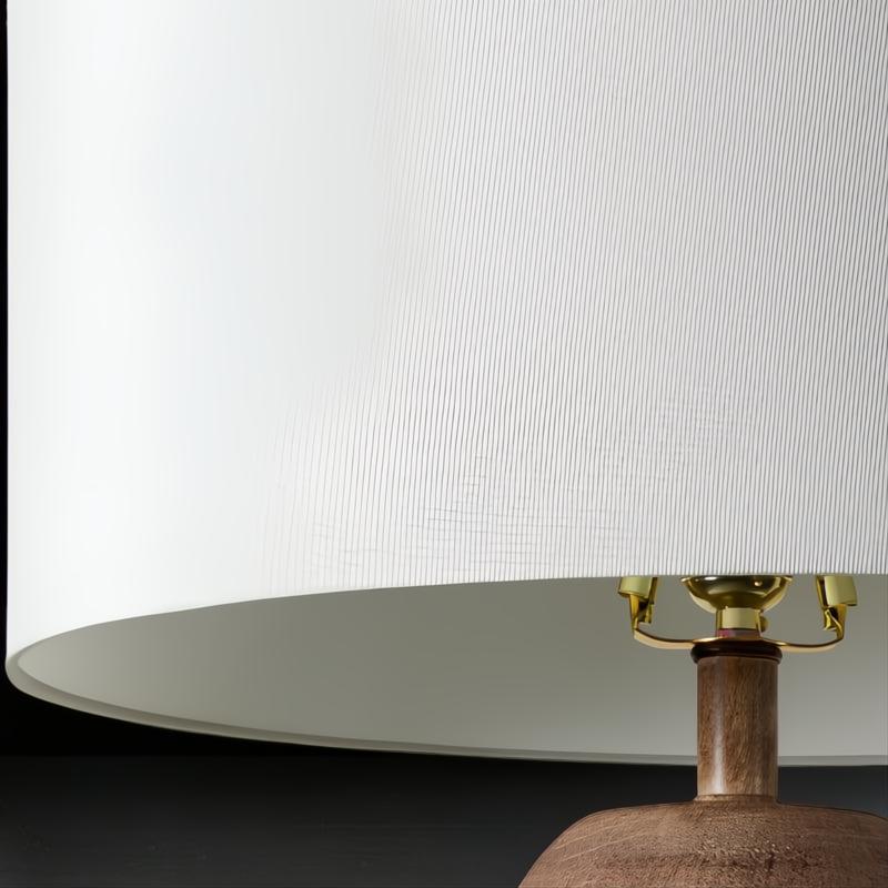 Close-up of Surya Algarve 62-inch accent floor lamp with white linen drum shade and brown wood-look body.