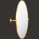 Surya Burnish oval wall mirror with an antiqued gold brass frame and pivot mount.