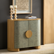 Surya Poros Cabinet with green lacquered cork veneer doors, brown natural oak base, and round handle.