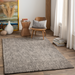 Surya Aiden wool area rug in Ink Blue and Charcoal with a medium pile, adding modern style to a room.