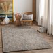 Surya Aiden wool area rug in Ink Blue and Charcoal with a medium pile, adding modern style to a room.