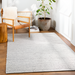 Surya Azalea AZA-2306 light gray hand-woven recycled PET yarn rug with subtle repeating pattern.