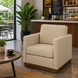 Surya Glendon swivel chair with beige polyester-linen upholstery and a brown rubber wood base.