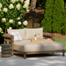 Surya Porta Daybed with beige Sunbrella cushion, brown hand-painted aluminum base, and wicker arms.