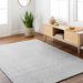 Surya Hope HOP2300 light blue and white flatwoven area rug made from recycled PET yarn.