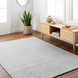 Surya Hope HOP2300 light blue and white flatwoven area rug made from recycled PET yarn.
