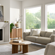 Surya Ronan RNO-001 brown lacquered mango wood cabinet with soft-close doors in a bright living room.