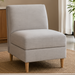 Light gray upholstered banquette chair with natural ash wood base and side cut-out detail.