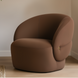 Surya Katarina accent chair, brown polyester, with a curved back and rounded seating, featuring a brass button detail.