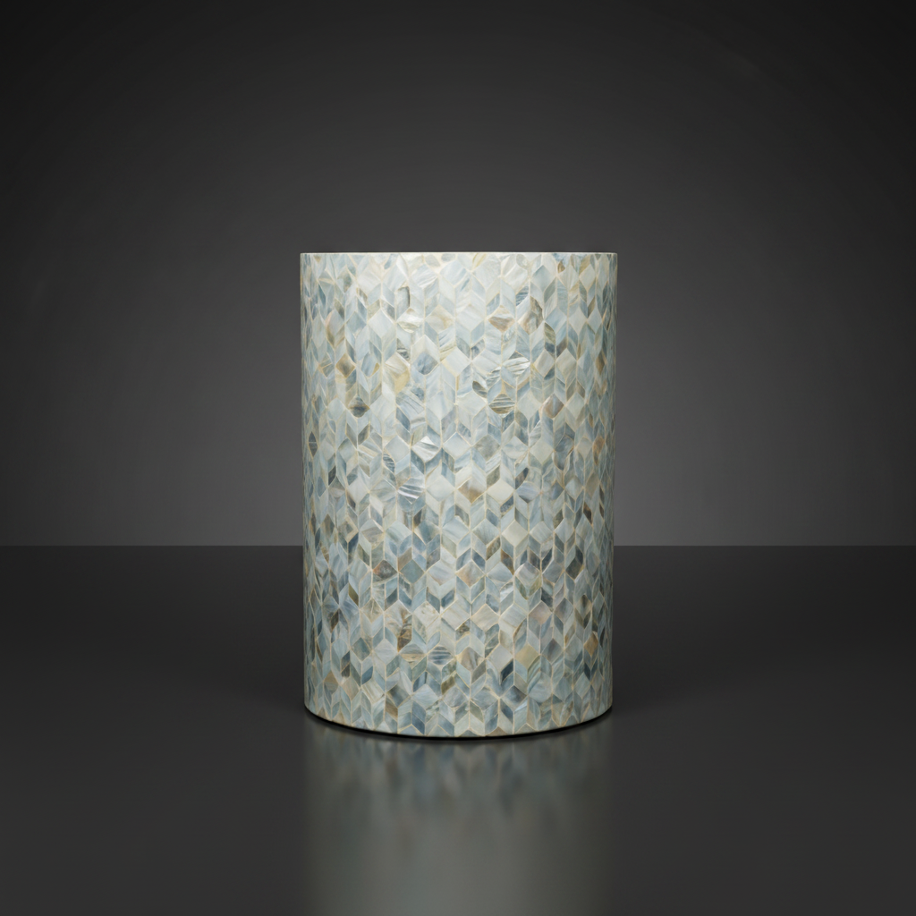 Round Surya Iridescent End Table with multi-tone shell detailing in tan, ivory, gray, denim, and ice blue.