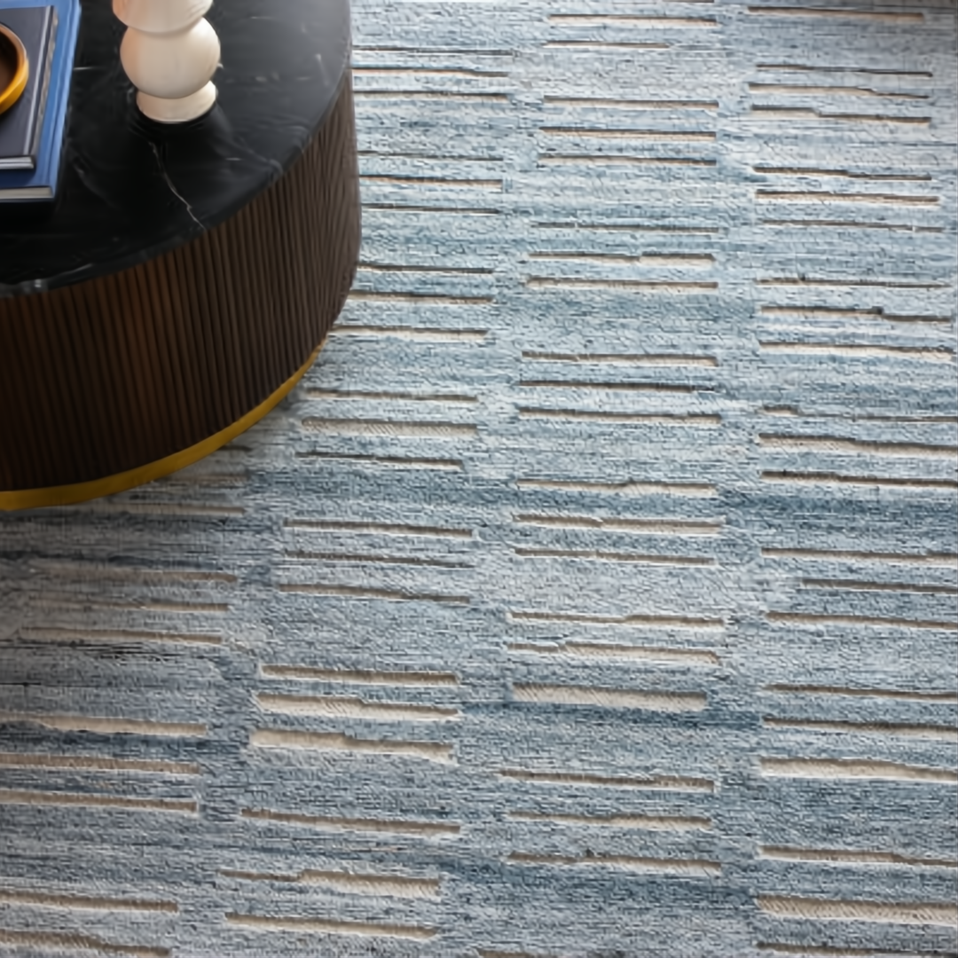 Surya Calgary CGR-2306-P area rug, pale blue and beige recycled PET yarn with a modern striped pattern.