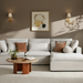 Spacious Surya Avington Slipcover Sofa in white linen and polyester with a chaise, accented by brown pillows.