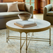 Surya Engel 36" square coffee table with white marble top and metallic brass iron base.