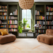 A spacious room with dark green built-in bookshelves, two brown armchairs, and a light-colored Surya Anadolu AAU-2307 area rug.