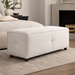 Surya Andra Ottoman, a long rectangular light beige polyester bench with tufted details and wooden legs.