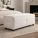 Surya Andra Ottoman, a long rectangular light beige polyester bench with tufted details and wooden legs.