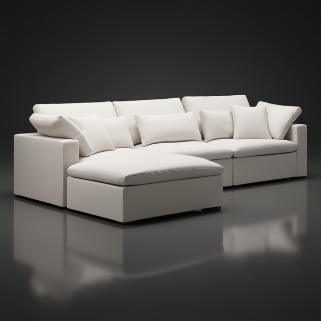 Surya Avington Ottoman in charcoal linen-polyester, paired with a matching sectional, on a dark reflective surface.