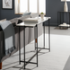 Surya Anaya console table with white natural marble top and black powder-coated iron base.