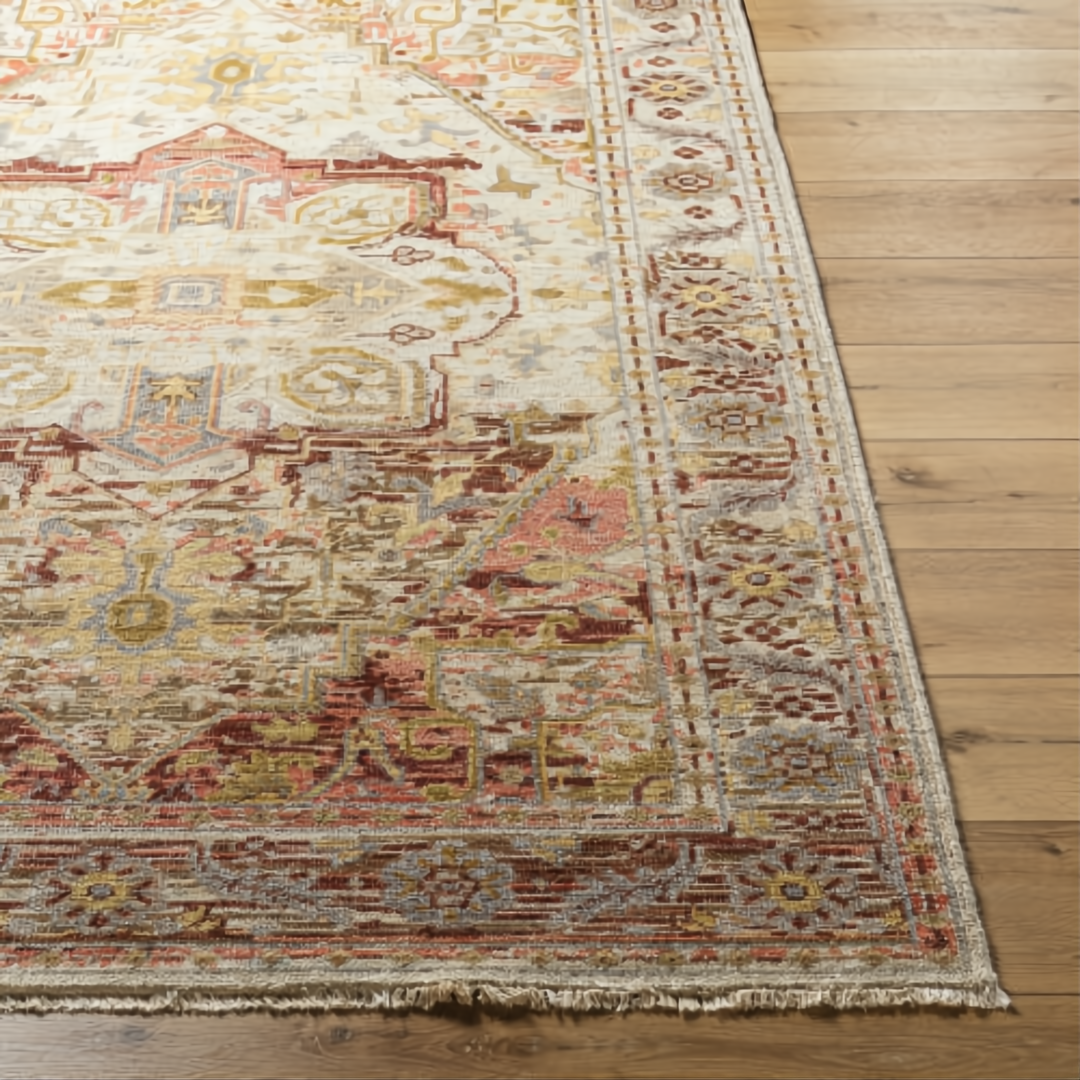 Hand-knotted Surya Cappadocia wool rug with traditional design in plum, gray, burgundy, and olive tones.