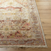 Hand-knotted Surya Cappadocia wool rug with traditional design in plum, gray, burgundy, and olive tones.
