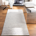 Surya Azalea AZA-2306 hand-woven rug with a subtle repeating geometric pattern in light gray and off-white.