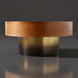 Surya Russula round coffee table with dark brown oak veneer top and metallic gold ombre iron base.
