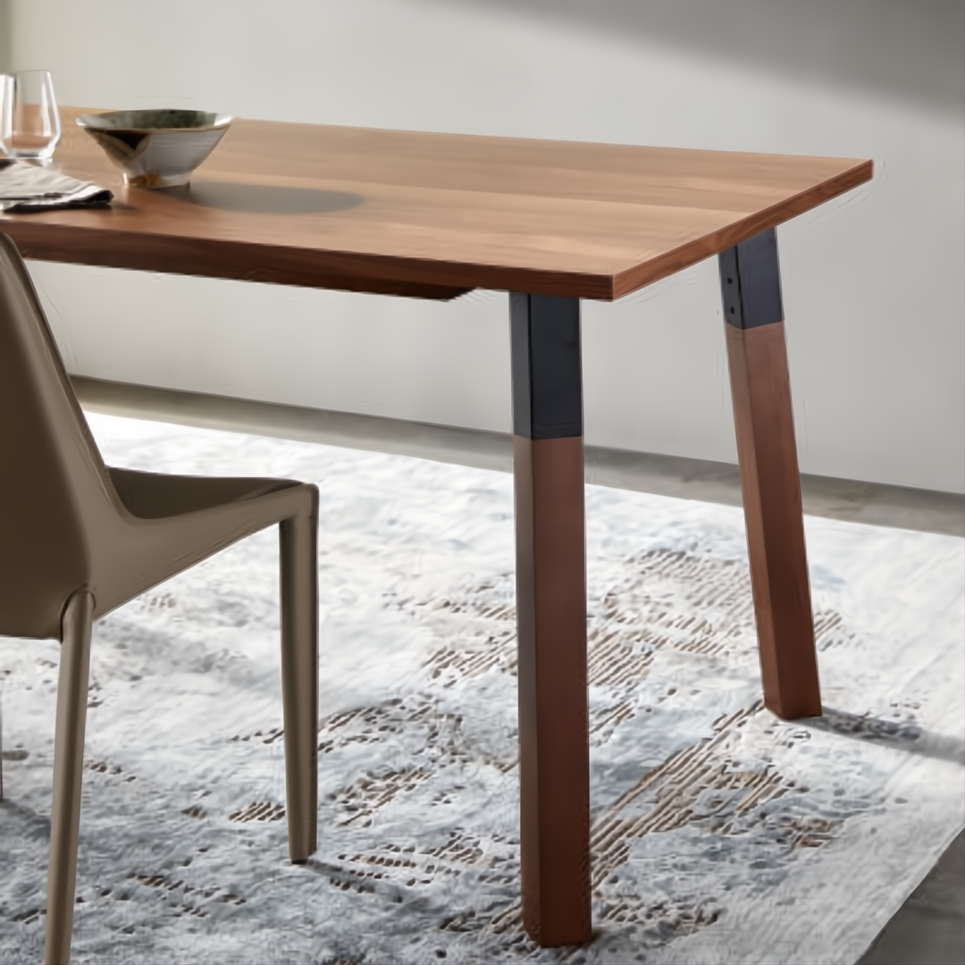 Surya Billings Dining Table with dark brown oak veneer top, rubber wood legs, and black metal accents.