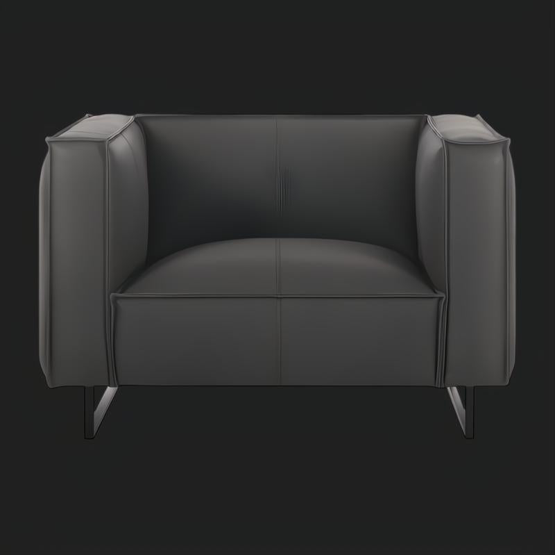 Surya Dylan Accent Chair: minimalist charcoal leather chair with a wide profile and black iron base.
