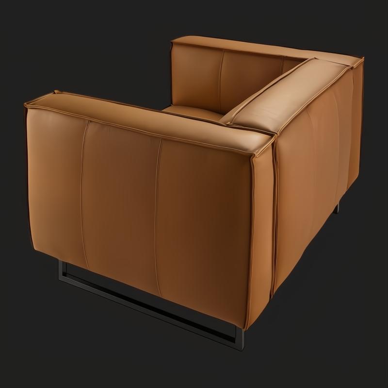 Modern Surya Dylan accent chair with brown leather cover and black iron base.