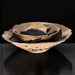 Modern sculptural aluminum decorative accent, gold and black finish, with a smaller bowl nested in a larger one.