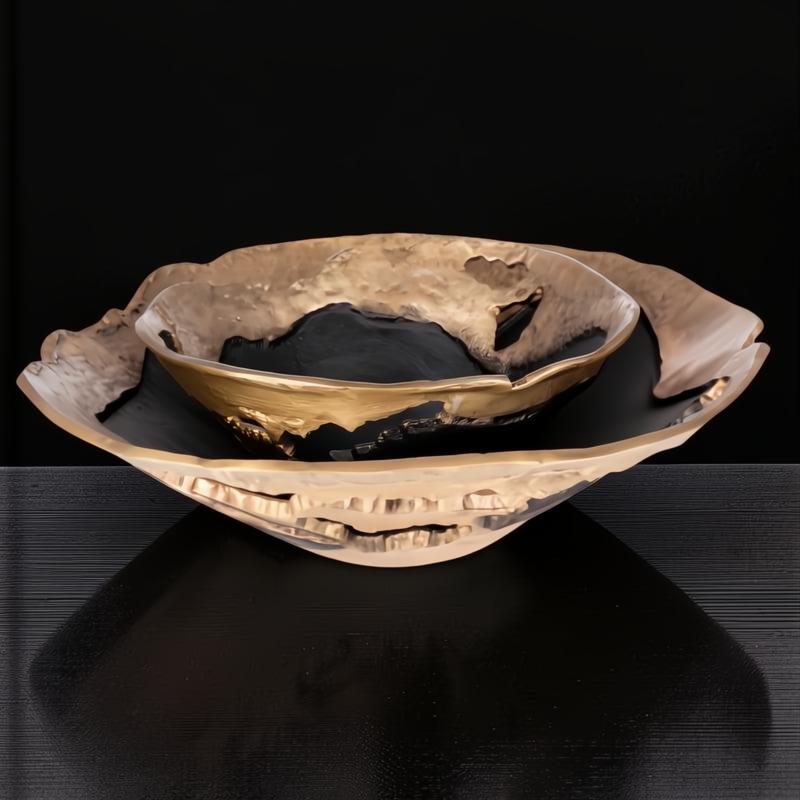 Modern sculptural aluminum decorative accent, gold and black finish, with a smaller bowl nested in a larger one.