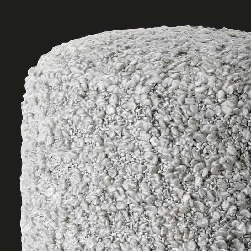 Light gray textured Surya Mohave pouf with a cozy, farmhouse cottage aesthetic, made from durable polyester.