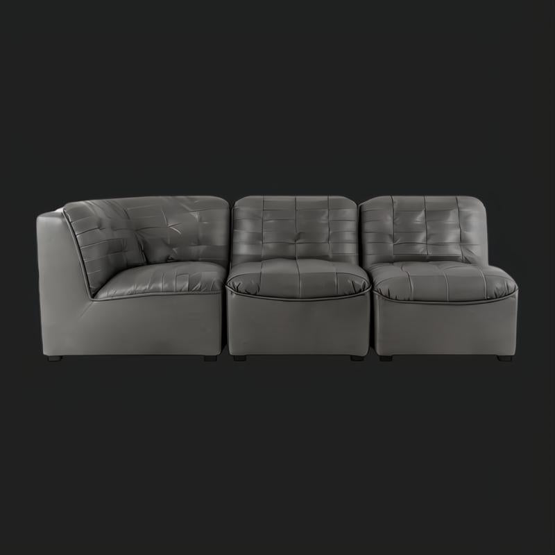Surya Oryan RYAN-005 black 100% leather modular sofa with tufted cushions.