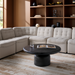 Light beige modular sofa with tufted cushions in a modern living room.